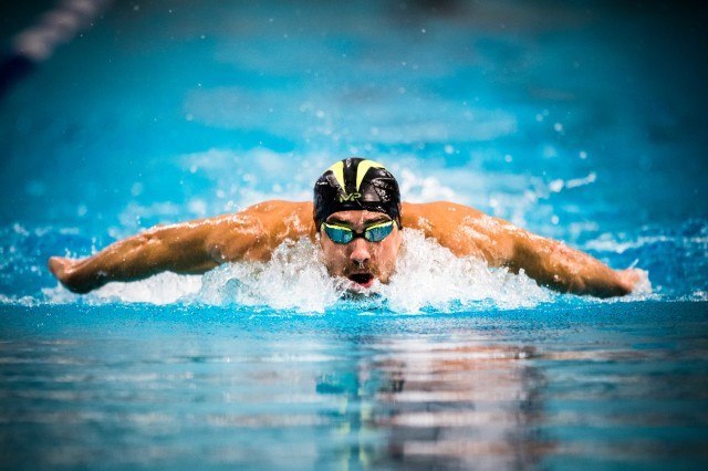 Michael Phelps qualifies first for the finals in the 200 IM in Austin Texas (photo: Mike Lewis)