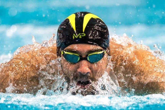 Michael Phelps qualifies first for the finals in the 200 IM in Austin Texas (photo: Mike Lewis)