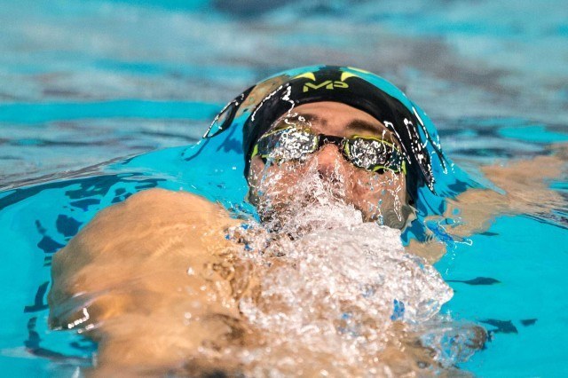Michael Phelps qualifies first for the finals in the 200 IM in Austin Texas (photo: Mike Lewis)