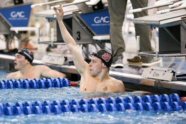 North Carolina State Sophomore Anton Ipsen celebrates a victory in the 500 free championship final, going 4:14.53. (Courtesy: Tim Binning/TheSwimPictures.com)