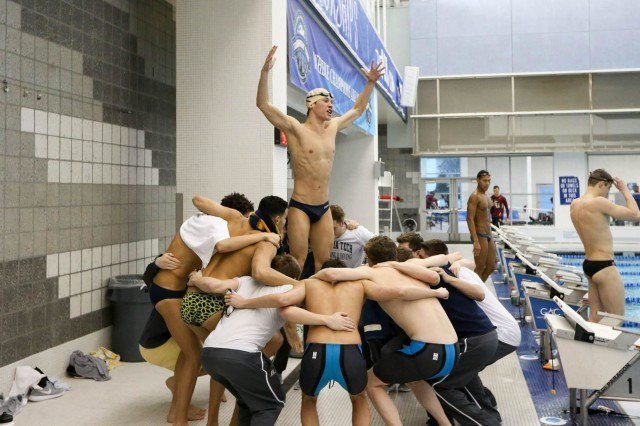 The Georgia Tech Swimming and Diving team does a team cheer before the start of finals on night two of the 2016 ACC Men's Swimming and Diving Championships held at the Greensboro Aquatic Center in Greensboro, NC February 24-27, 2016. (Courtesy: Tim Binning/TheSwimPictures.com)