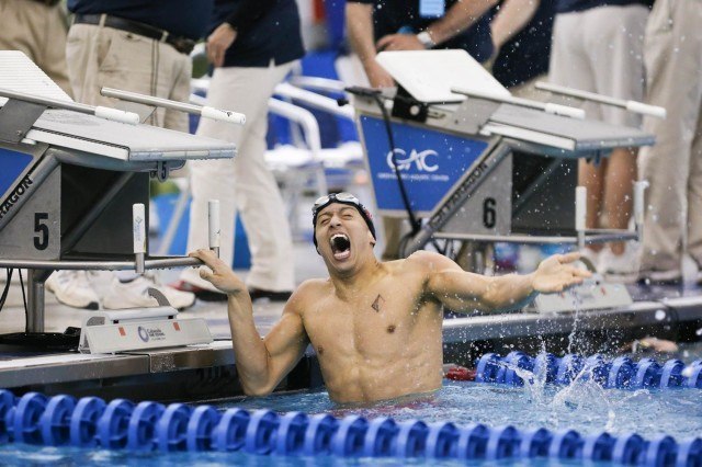 North Carolina State Senior Christian McCurdy celebrates a 200 IM B-final victory after going 1:45.07. (Courtesy: Tim Binning/TheSwimPictures.com)