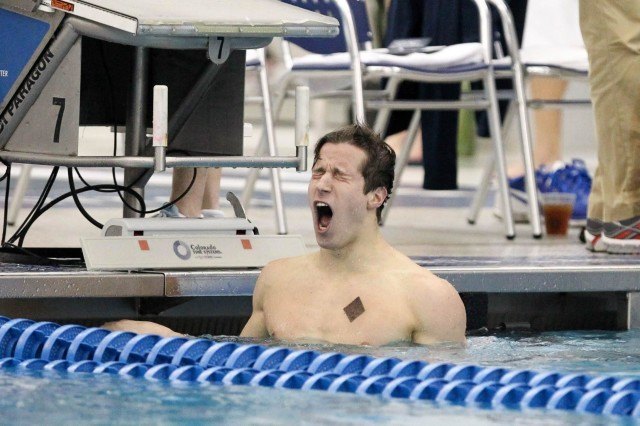 NC State Junior Derek Hren won the 100 breast from lane 7, touching out top seed Brandon Fiala by .01/second with a 52.27. (Courtesy: Tim Binning/TheSwimPictures.com)
