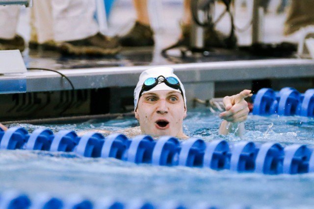 UNC Senior Sam Lewis wins the 100 fly in 45.77. (Courtesy: Tim Binning/TheSwimPictures.com)
