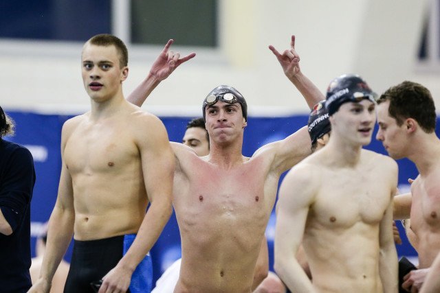 The Texas 400 medley relay post-race, Will Licon throwing up those horns. Photo Credits: Tim Binning/TheSwimPictures.com