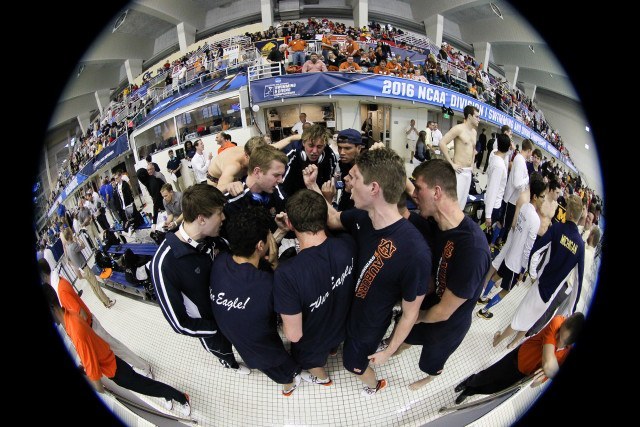 The Auburn Tigers circling up before the night's races. Photo Credits: Tim Binning/TheSwimPictures.com