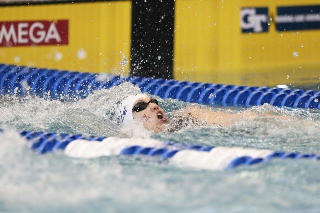 Top-seed, Courtney Bartholomew, coming to the finish in the 100 back. Photo Credits: Tim Binning/TheSwimPictures.com