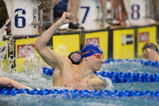 Caeleb Dressel in the water after the 100 free final.
