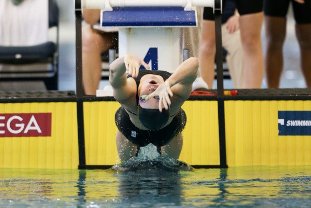 Ally Howe launching off the backstroke start in Stanford's top qualifying 200 medley relay. Photo Credits: Tim Binning/TheSwimPictures.com