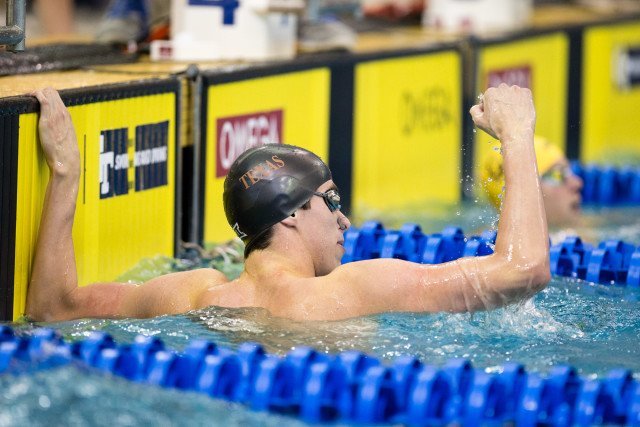 Will Licon full of Longhorn pride after sneaking in under the flags for the 200 IM NCAA title. Photo Credits: Tim Binning/TheSwimPictures.com
