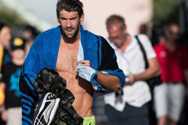 Michael Phelps takes the win in the 200 fly at the Mesa stop of the USA Swimming Pro Swim Series (photo: Mike Lewis)
