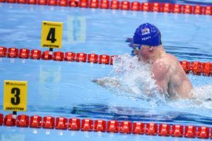 Peaty cruises to victory in men's 100 breast.