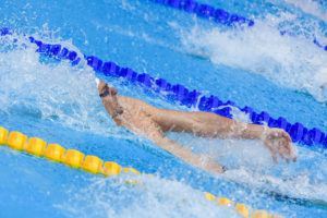 Lacourt went out hard and held on to win the 100 back.