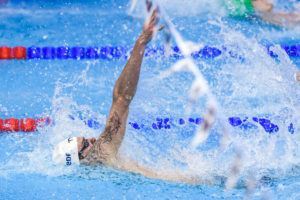 Camille Lacourt stroking to the win in the men's 100 back.