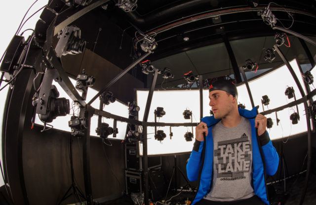 Rio-bound British swimmer Chris Walker-Hebborn sits inside the inside the swim-lab head scanning rig. (photo: courtesy of adidas swim)