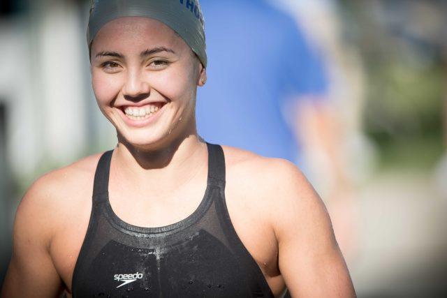 Noemie Thomas wins the 100 fly at the 2016 Santa Clara Pro Swim (photo: Mike Lewis)