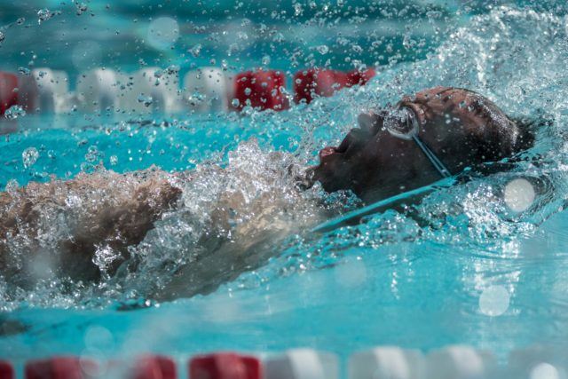 Actor Thornton Cooper (Parks and Recreation) off in the 50 back at the US Masters Nationals in Oregon (Photo: Mike Lewis - Courtesy of U.S. Masters Swimming)