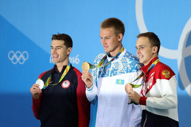 Olympic Podium: Josh Prenot, Dmitriy Balandin, Anton Chupkov - 2016 Rio Olympics/photo credit Simone Castrovillari