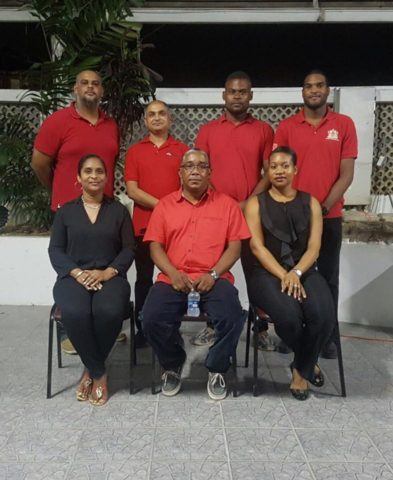 Front Row (left to right): Andrea Brache (Secretary), Wendell Lai Hing (President), Chantal Ross-Thomas (2nd Vice President) Back Row: Franz Huggins (1st Vice President), Indardeo Maharaj (Treasurer), Jason Wickham (Public Relations Officer), Anthony Edwards (Assistant Secretary/Treasurer)