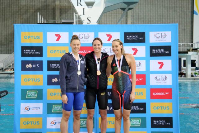 Women's 100m backstroke podium: Emily Seebohm (gold, center), Minna Atherton (silver, left), Madison Wilson (bronze, right); courtesy of Swimming Australia