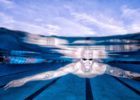 Olympic Champion Swimmer Caeleb Dressel underwater by Mike Lewis
