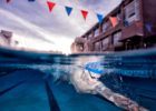 Olympic Champion Swimmer Caeleb Dressel underwater by Mike Lewis