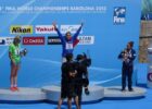 "Martina Grimaldi on top of the BCN2013 women's 25K medal podium" by morshus is licensed under CC BY-NC-ND 2.0