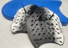 How to Use Swim Paddles to Develop a Stronger Stroke